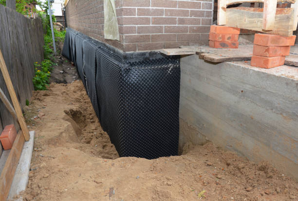 Happy homeowners after waterproofing job in Jeffersonville